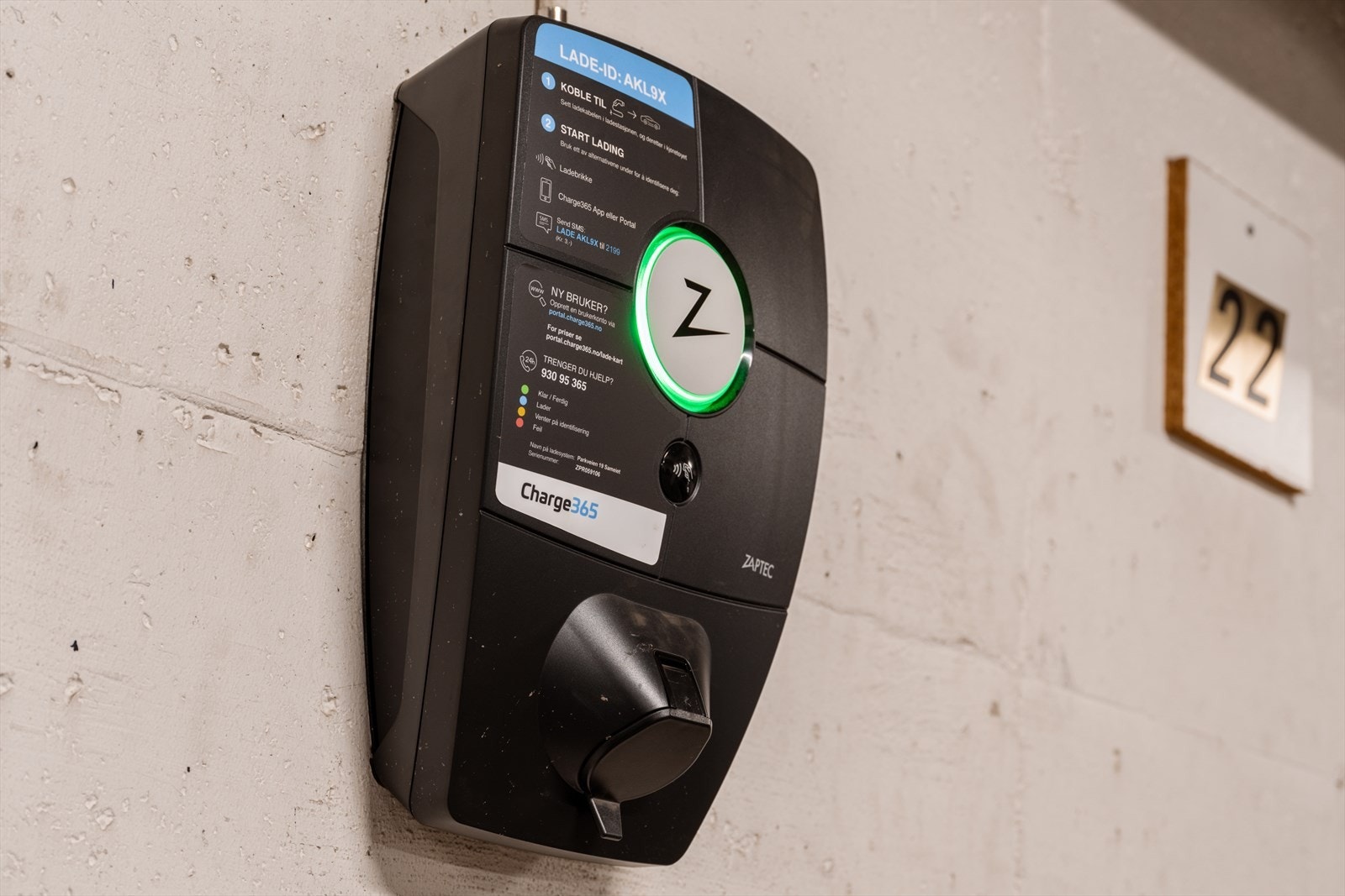 Det er elbillader på parkeringsplassen selger leier i dag. Galleribilde