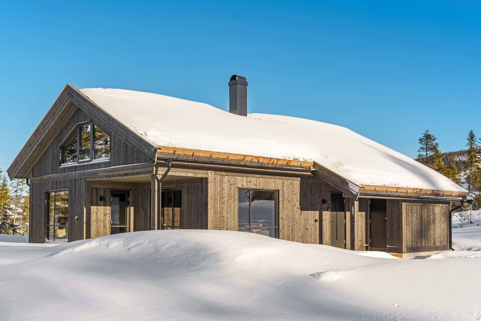 Avbildet hytte er av identisk hytte beliggende i samme felt Galleribilde