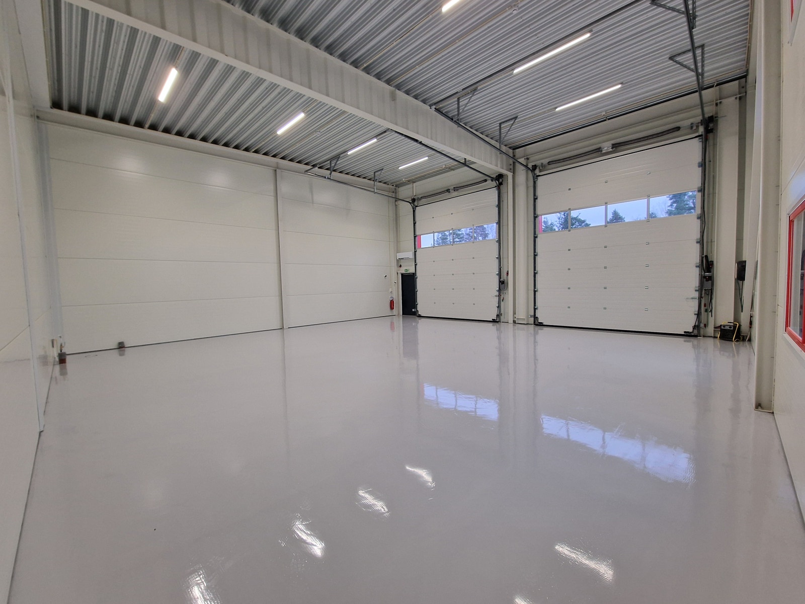 Sjelden mulighet: Seksjon med 2 porter – effektiv adkomst og vareflyt Galleribilde