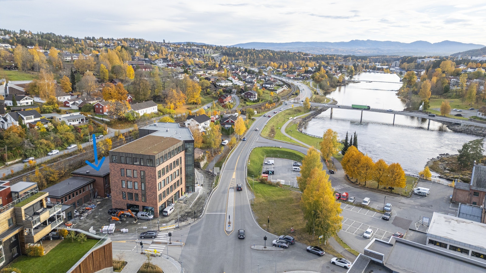Blå pil viser hvilken del av bygget som er til leie Galleribilde