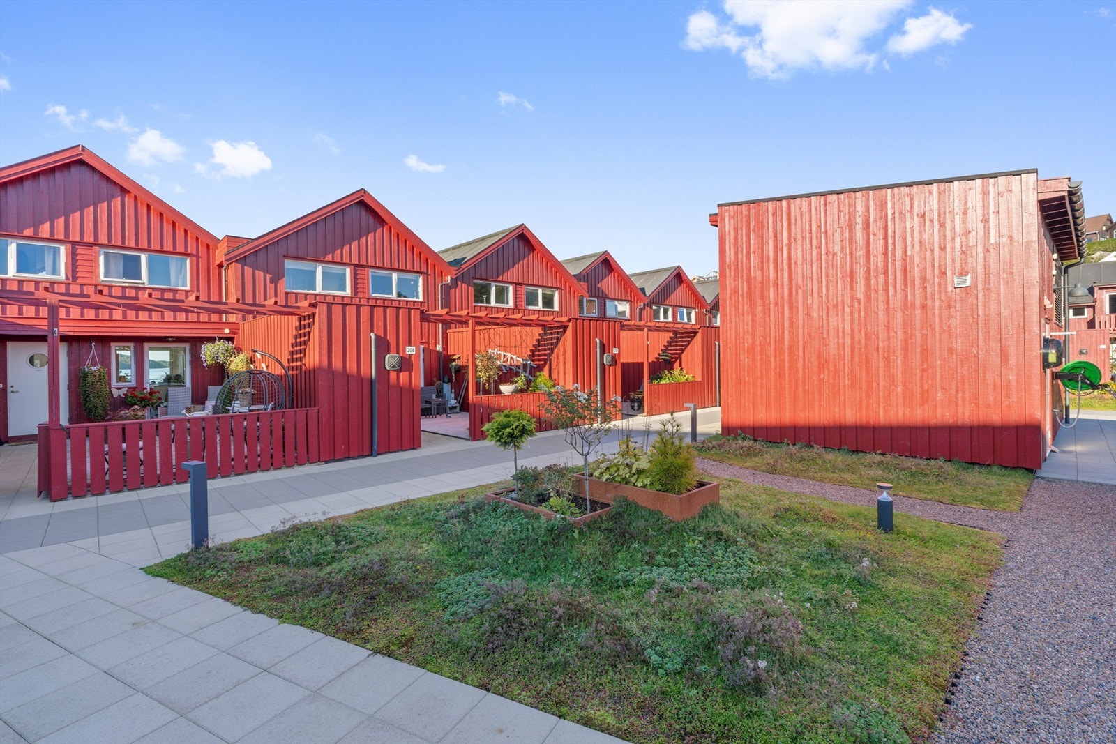 Riskakverven Borettslag har et skjermet og beplantet felles atrium. Galleribilde