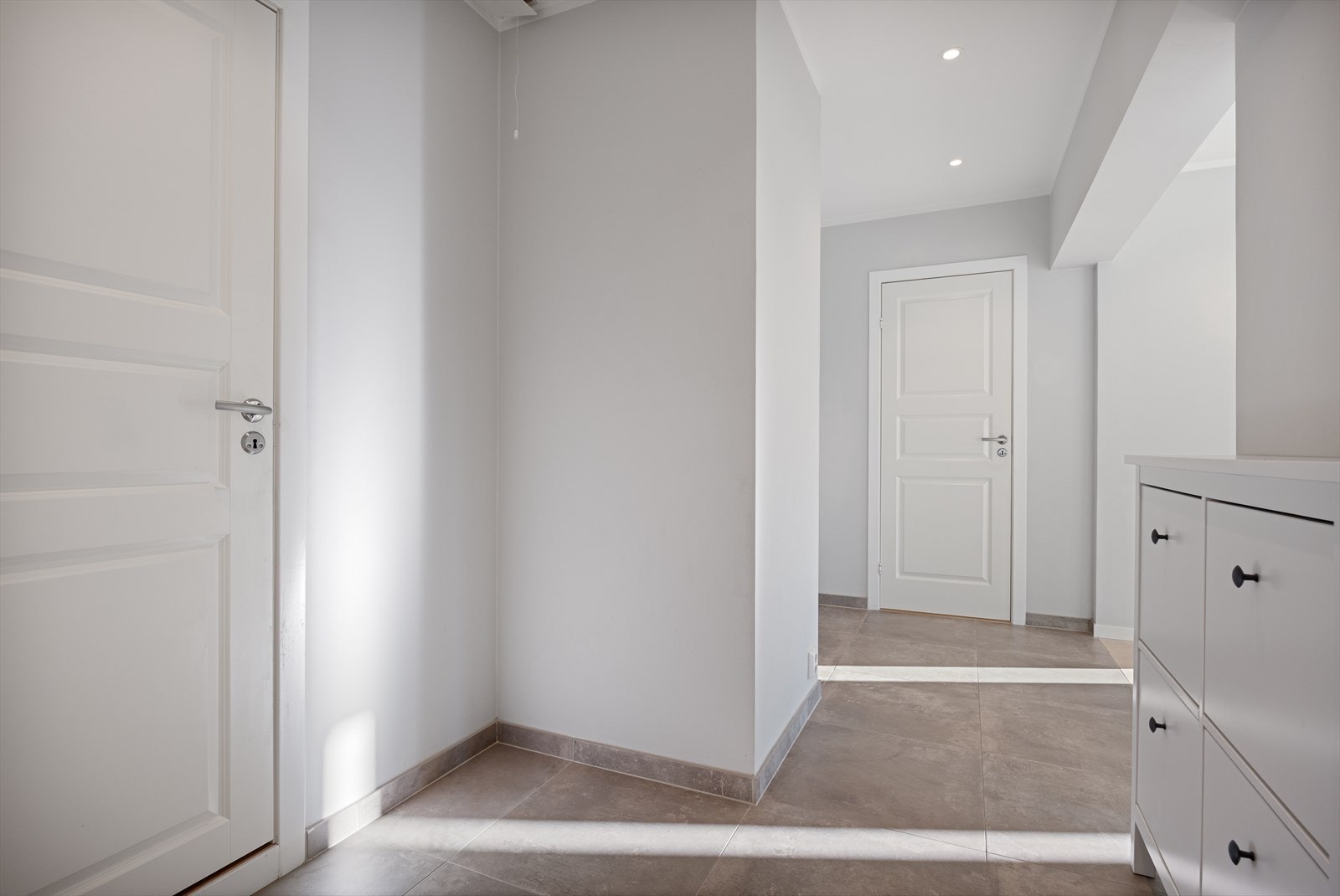 Det er gulvvarme i de flislagte delene av leiligheten. Galleribilde