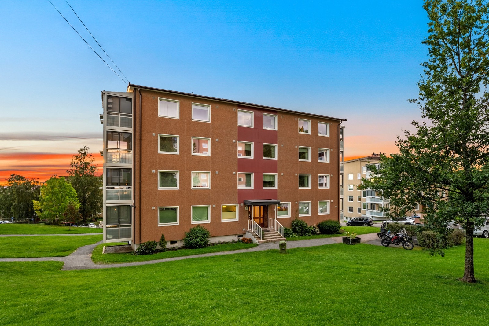 I Godlia borettslag er det store grøntarealer og godt med luft mellom bebyggelsen. Galleribilde