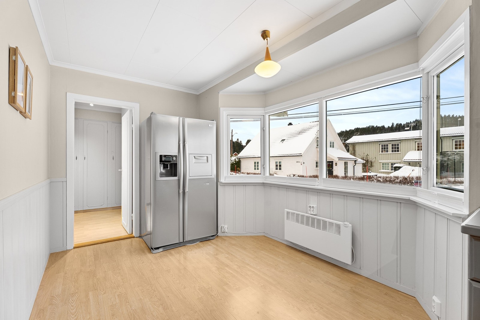 det er også plass til en liten koselig sittegruppe her på kjøkkenet Galleribilde