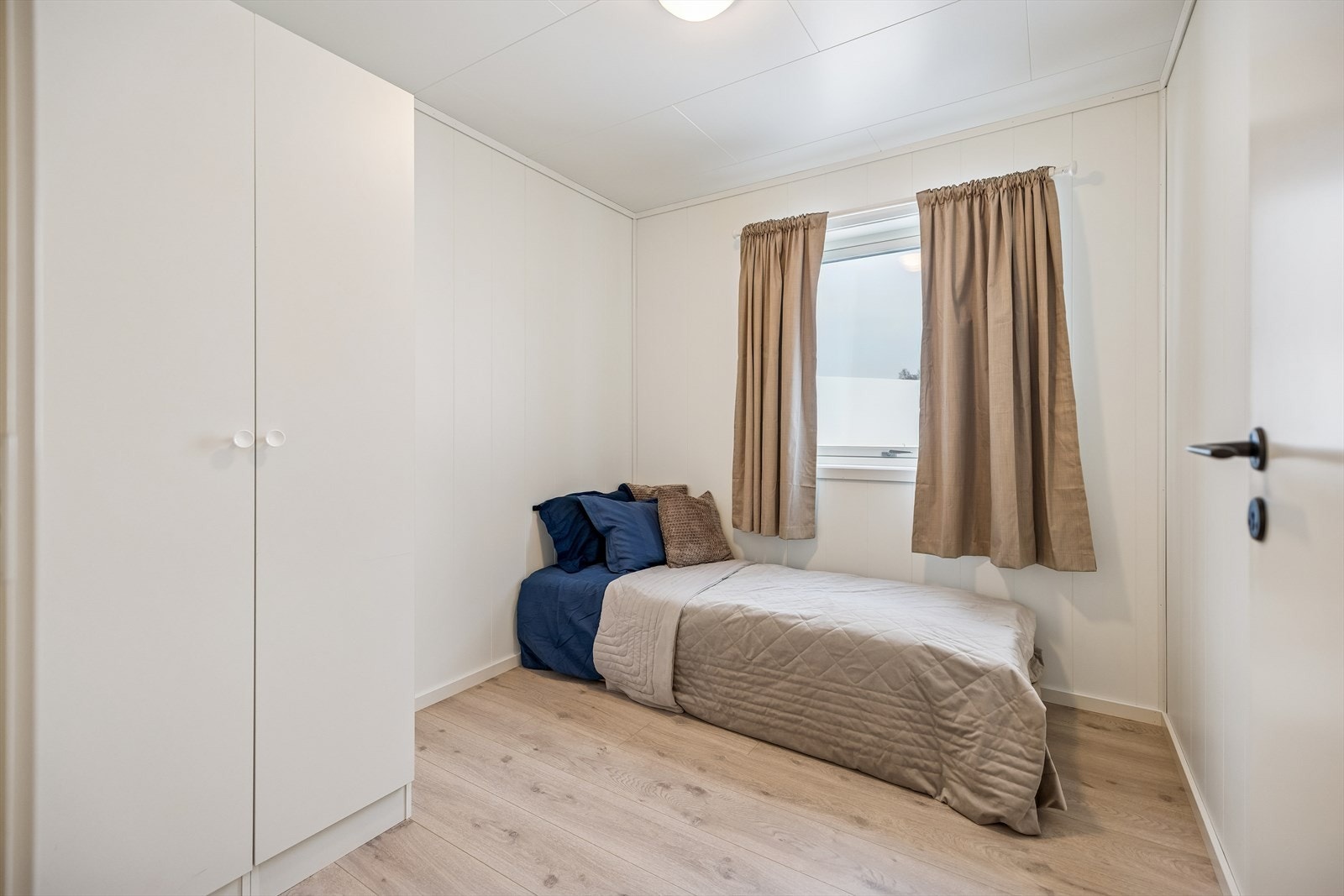 Også det andre soverommet har vannbåren gulvvarme for ekstra komfort. Galleribilde