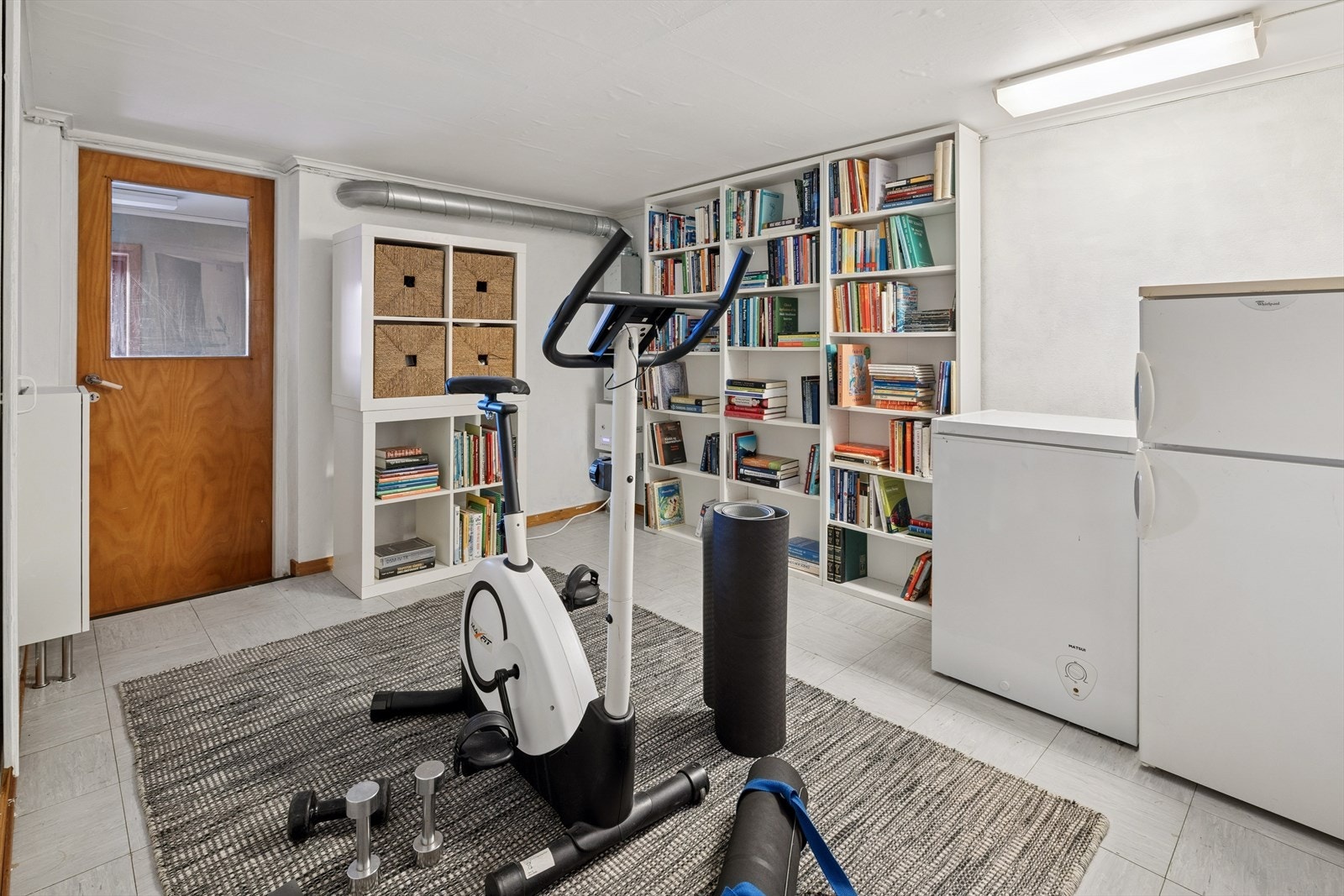 Praktisk rom brukt som både trimrom og lagringsplass - fleksibelt og funksjonelt etter behov. Galleribilde