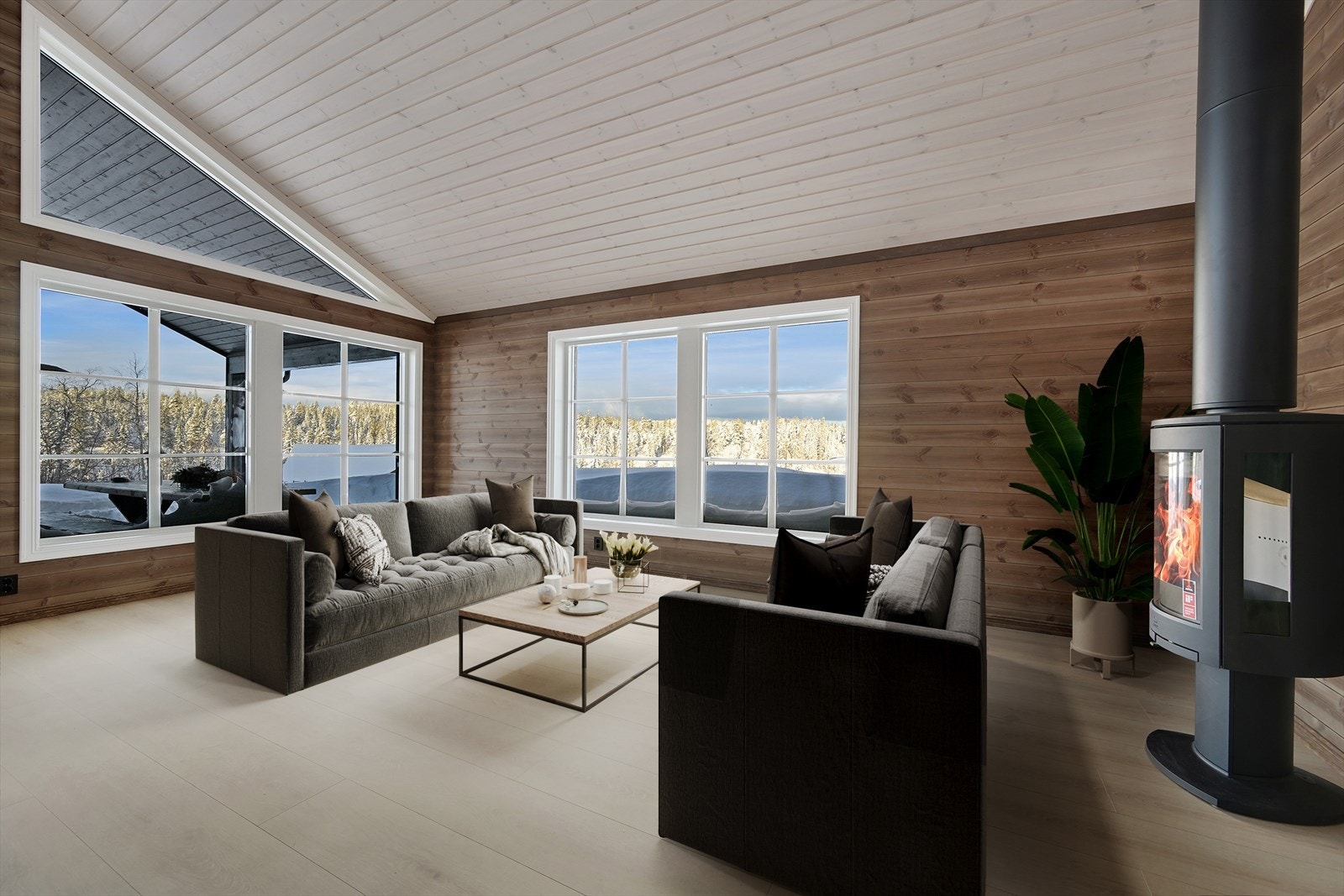 En god og varm peisovn i stuen. Digitalt møblert bilde Galleribilde