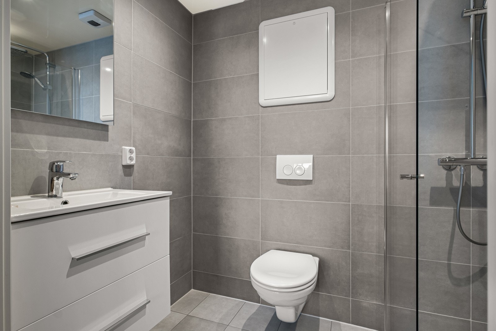 Flislagt bad med vannbåren gulvvarme. Galleribilde