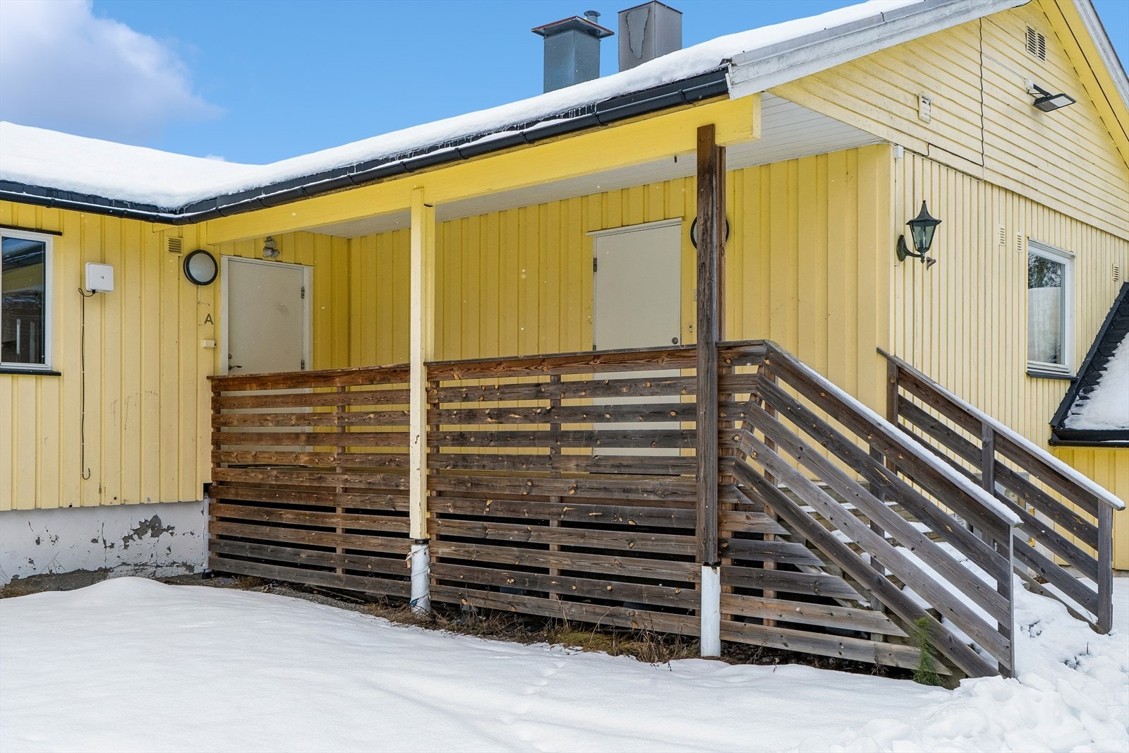 Hver enhet har separat inngang fra felles, overbygget inngangsparti Galleribilde