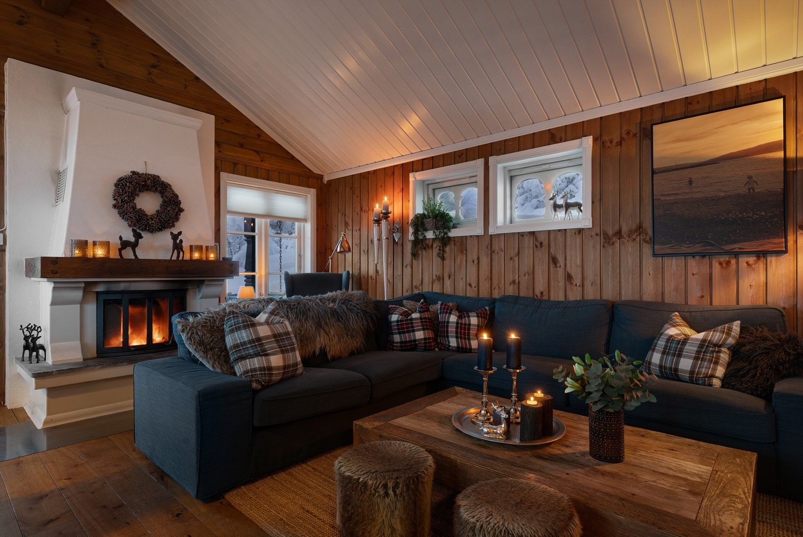 Samle flokken her etter en lang da ute, mens roen senker seg til knitring av peisen? Galleribilde