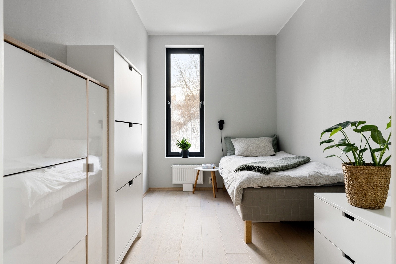 Leilighetens andre soverom er målt til 7,5 kvm og egner seg godt som barnerom, gjesterom eller hjemmekontor. Galleribilde