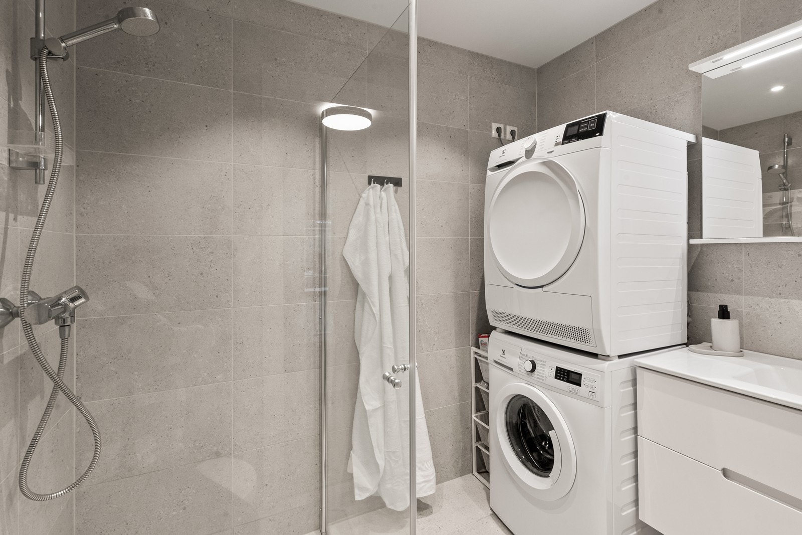 Badet har opplegg for vaskemaskin. Galleribilde