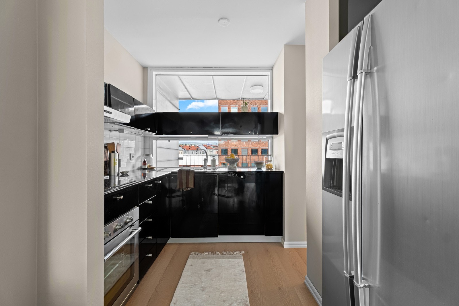 Pent kjøkken med gode løsninger. Galleribilde