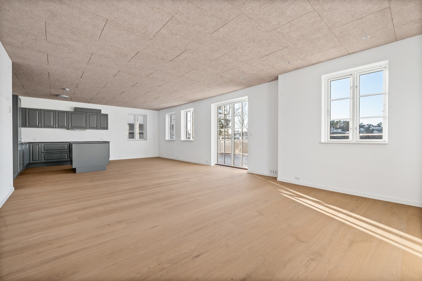 Stue og kjøkken i åpen løsning Galleribilde