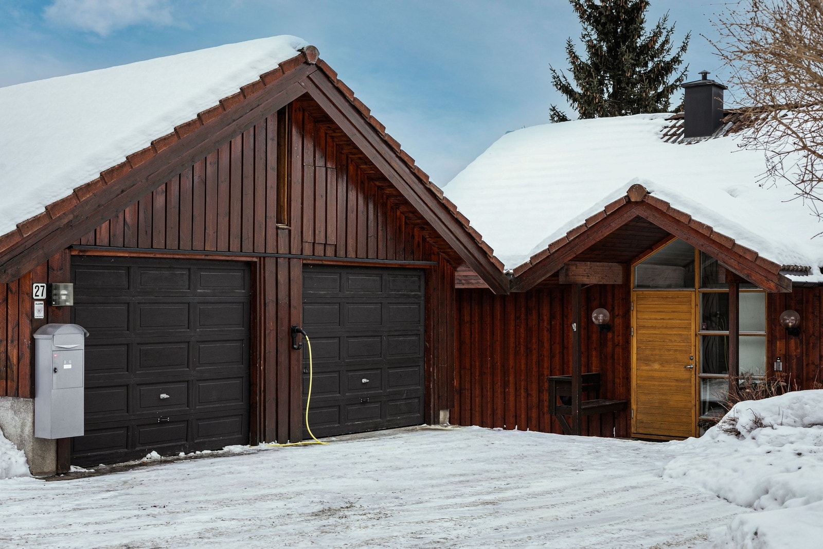 Lagringsloft over garasjen gir ekstra oppbevaringsplass. Galleribilde