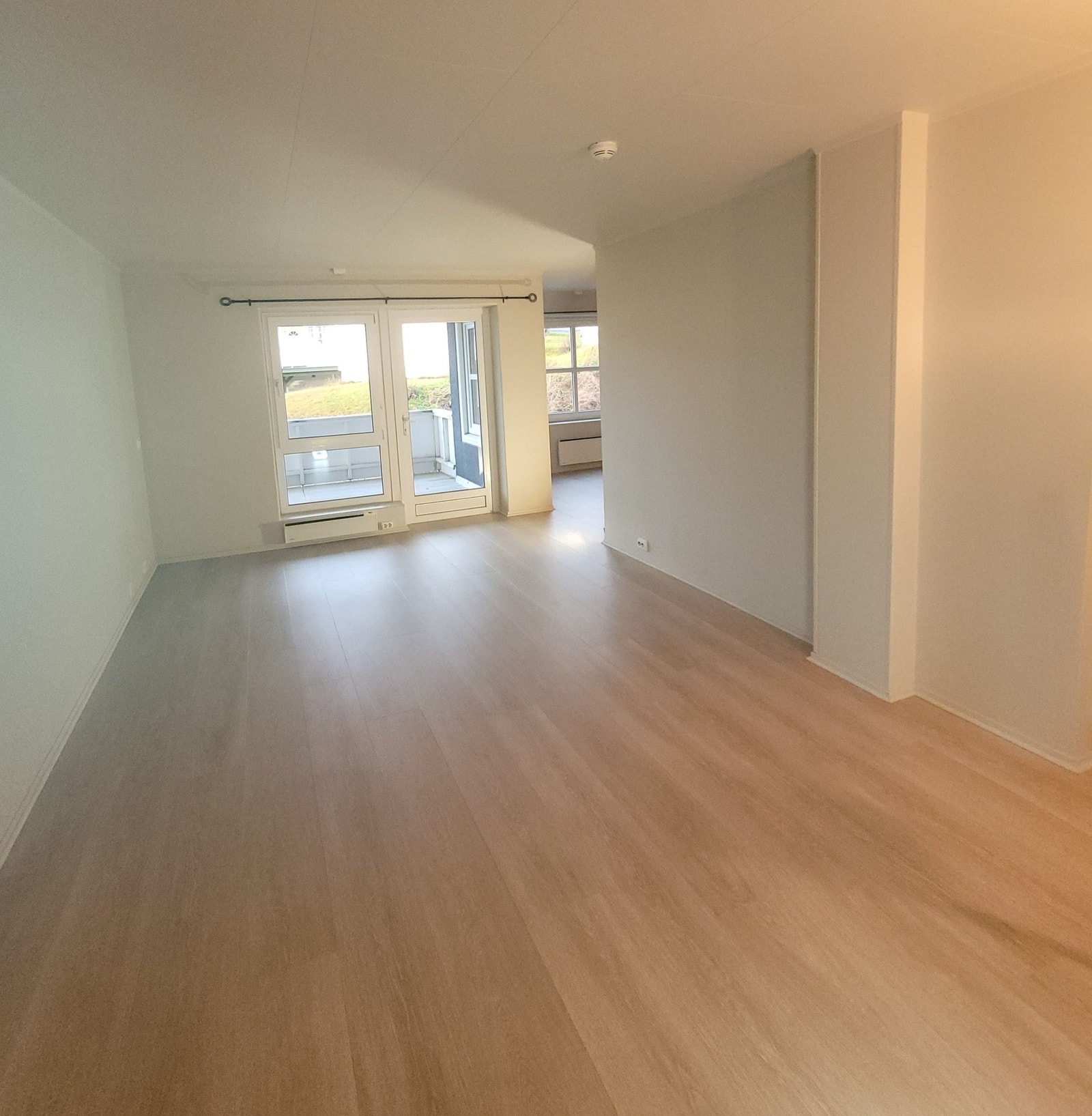 Stue, gulvet avviker fra bildet. Galleribilde