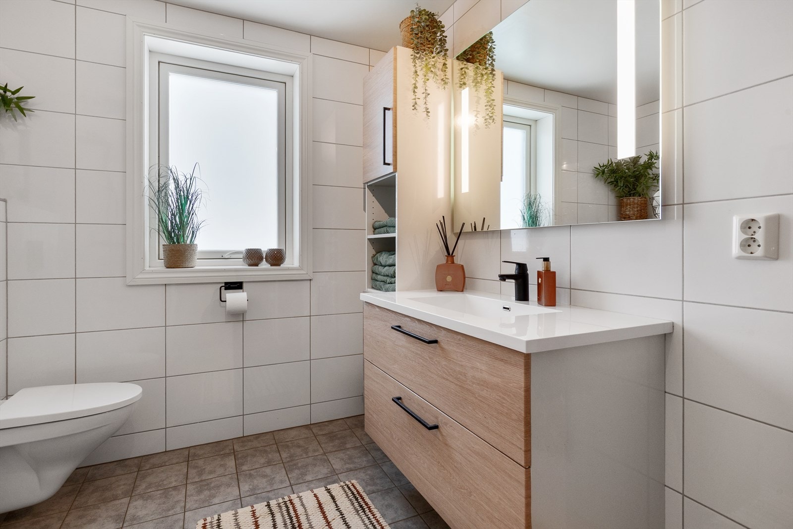 Flislagte overflater med et tidløst uttrykk. Elektrisk gulvvarme. Galleribilde