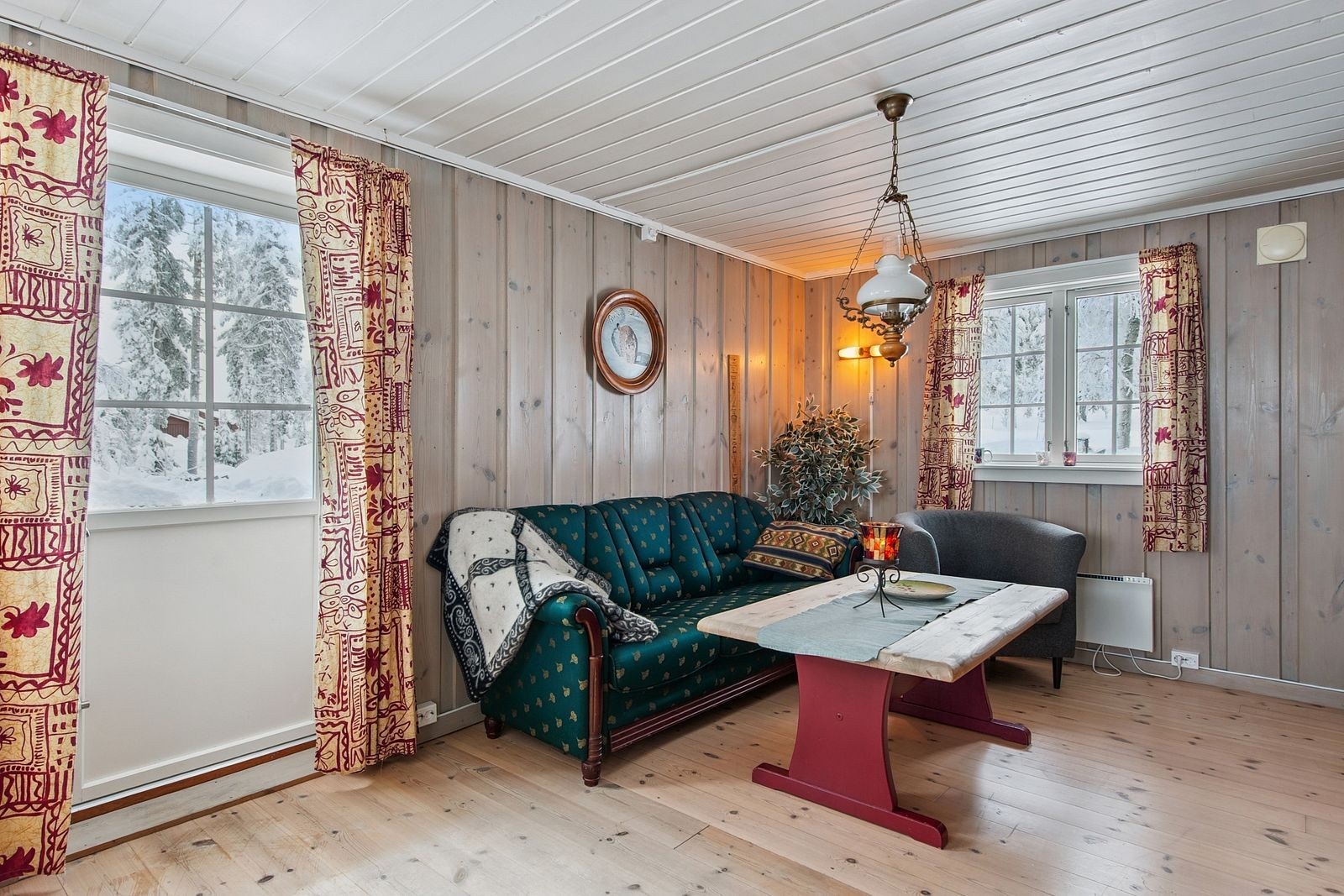 En egen krok for sofagruppen gir en fin sone for avslapning. Galleribilde