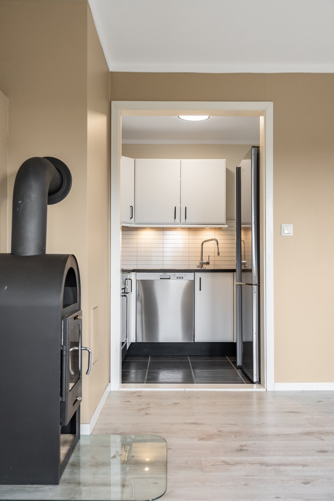 Stuen har delvis integrert løsning med kjøkkenet Galleribilde