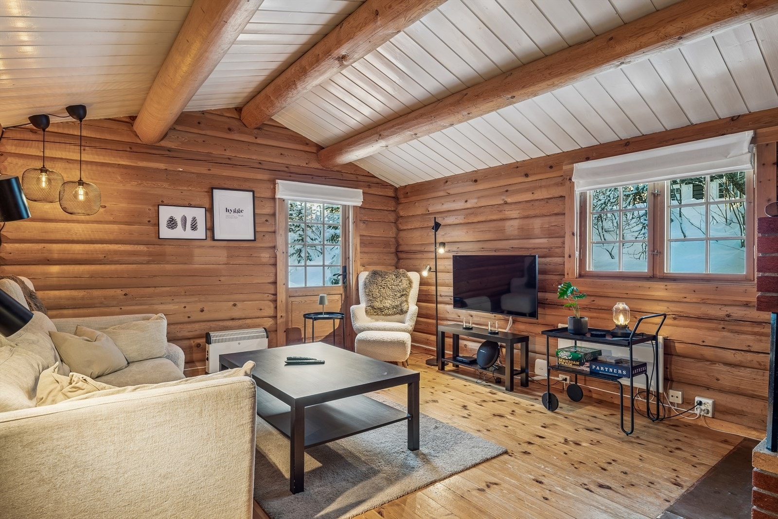 Stuen har en lun og innbydende atmosfære. Galleribilde