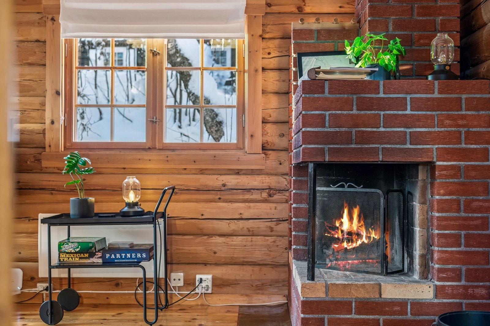 En solid, murt peis er perfekt i den kalde vinterkvelden og gir god varme og ekstra hygge. Galleribilde