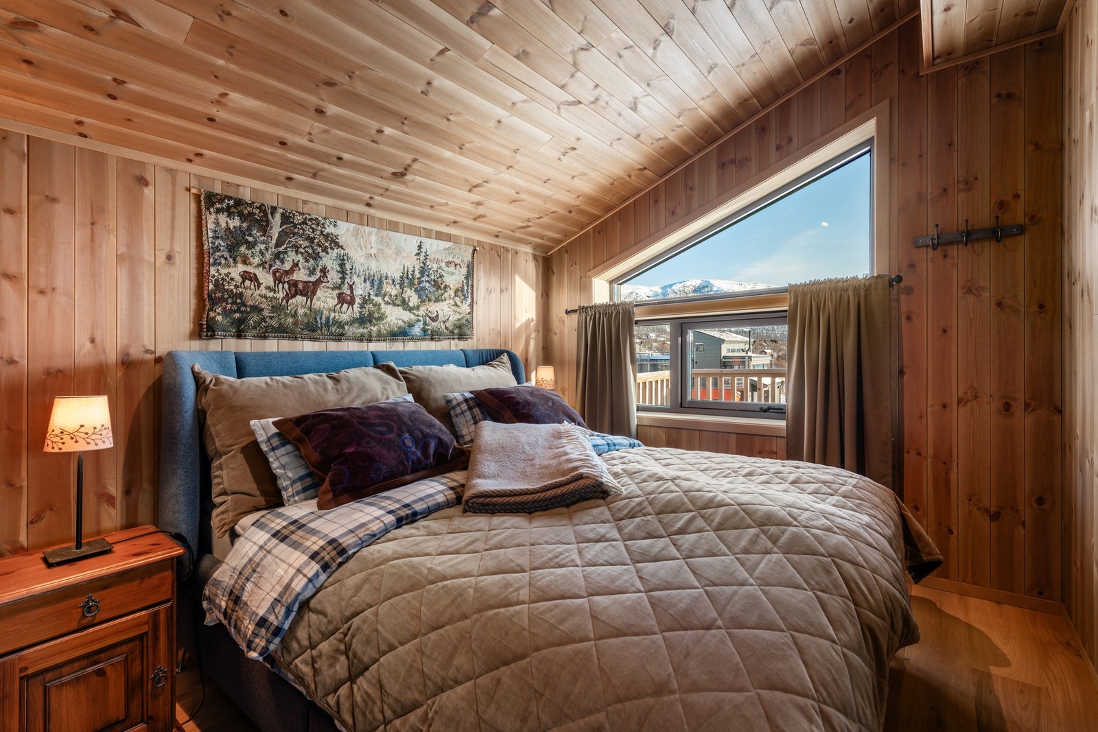 Ett av leilighetens tre soverom Galleribilde