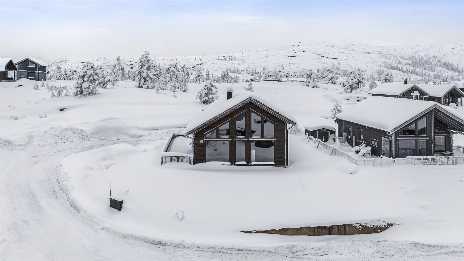 Hytten ligger rolig til i blindvei Galleribilde