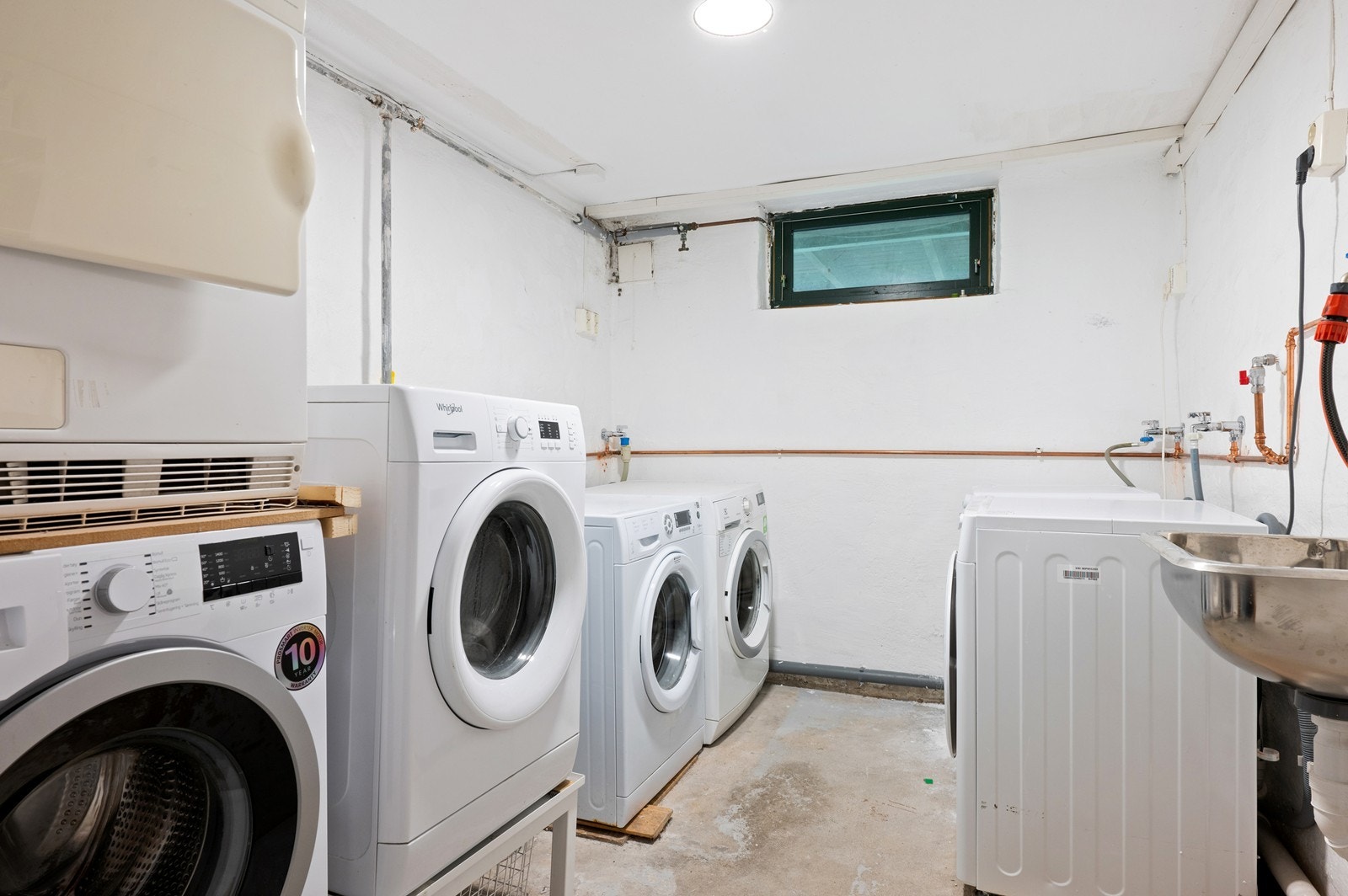 Felles vaskerom i kjeller. Galleribilde