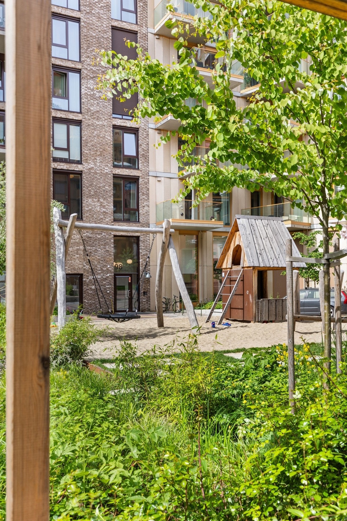 To gjesteleiligheter, hobbyrom, og en stor grønn byhage i sameiet Galleribilde