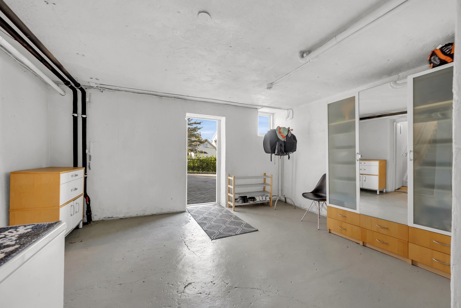 Boligens tredje inngang er i underetasje - rommet er byggemeldt som kjellerrom. Galleribilde