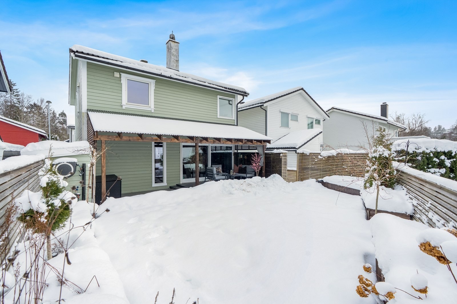 Eiendommen har en inngjerdet tomt. Galleribilde