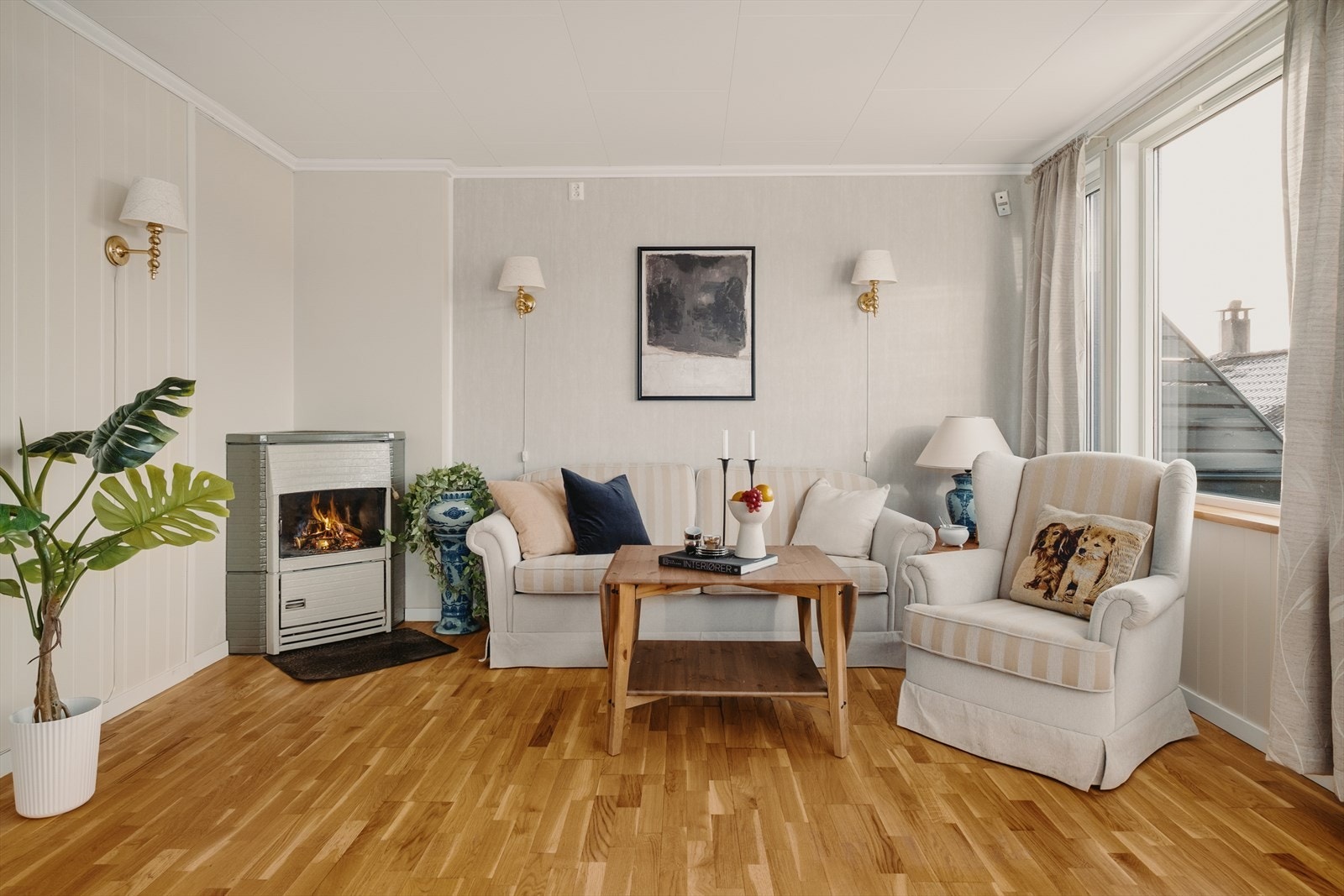 Vedovn i stuen. Galleribilde