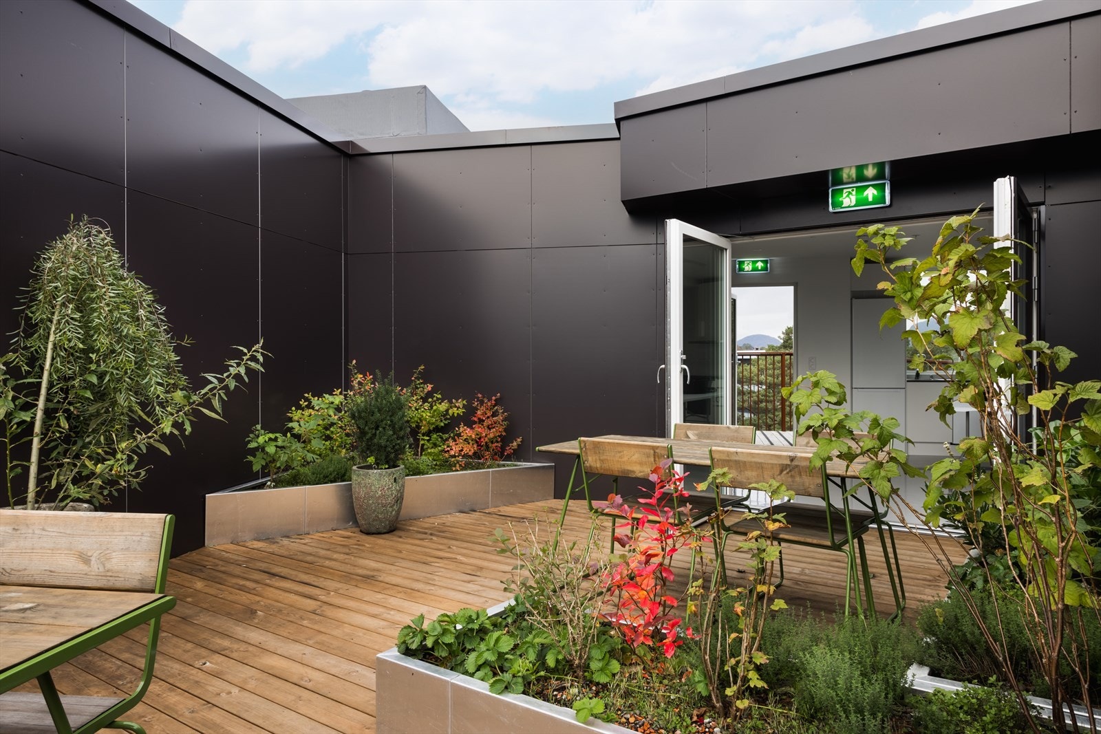 Her kan man nyte fine solskinnsdager Galleribilde