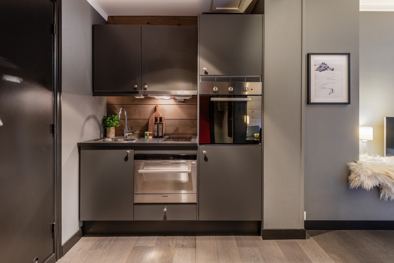 Kjøkkenet har komfyrvakt Galleribilde