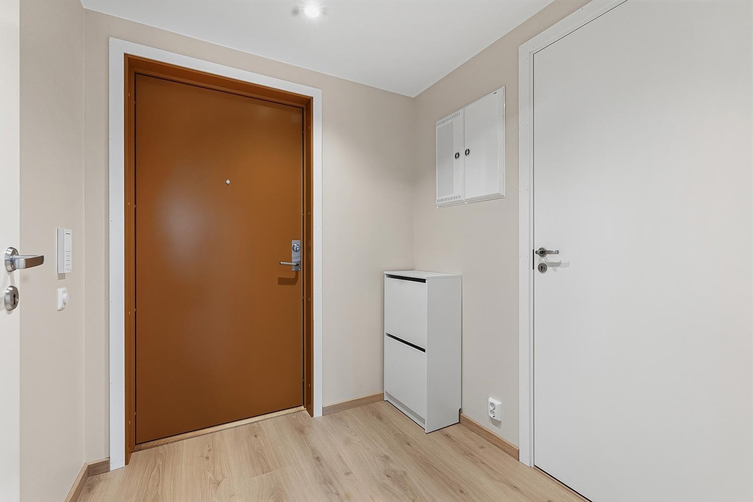 Entre med plass til å sette fra seg sko. Galleribilde