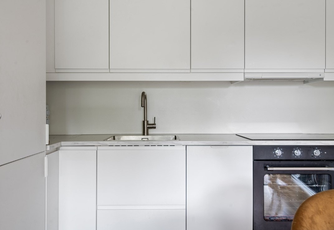 Kjøkken med integrerte hvitevarer. Galleribilde