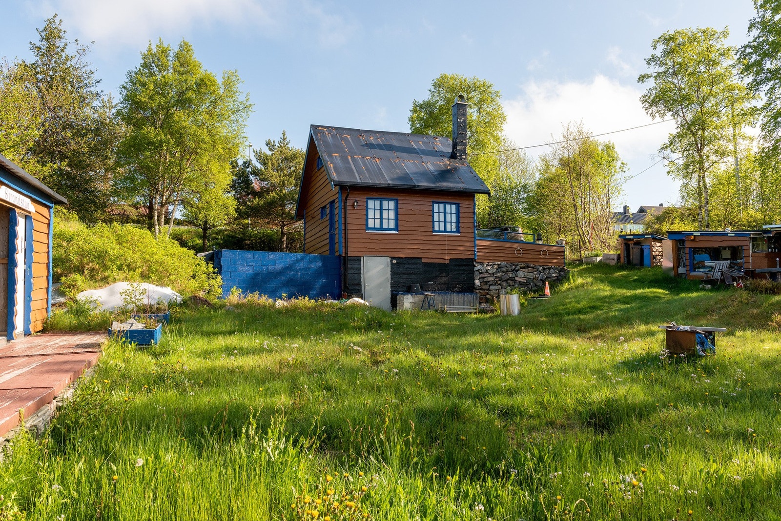 Solrik tomt. Galleribilde