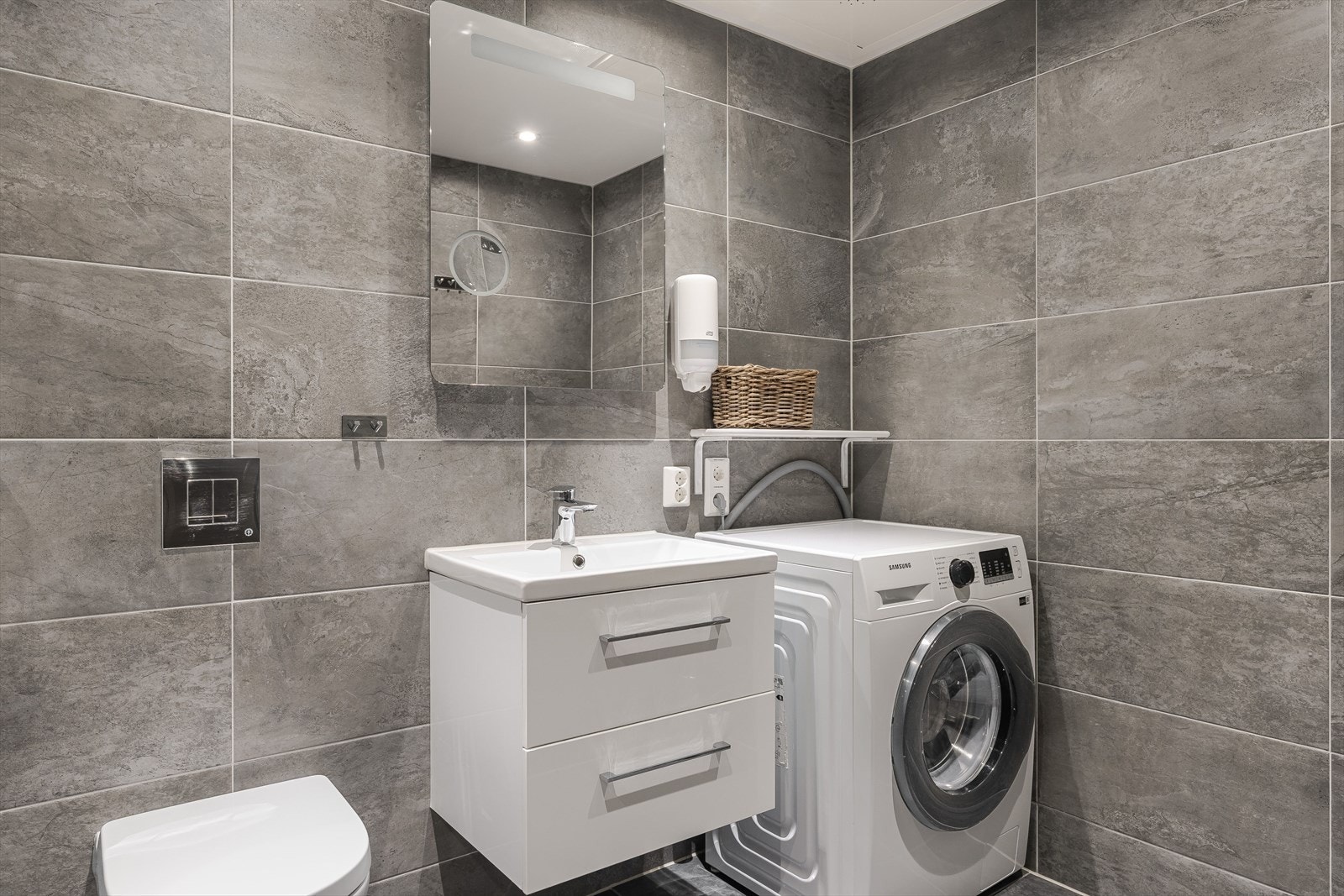 I hjørnet er det plass og opplegg for vaskemaskin. Galleribilde