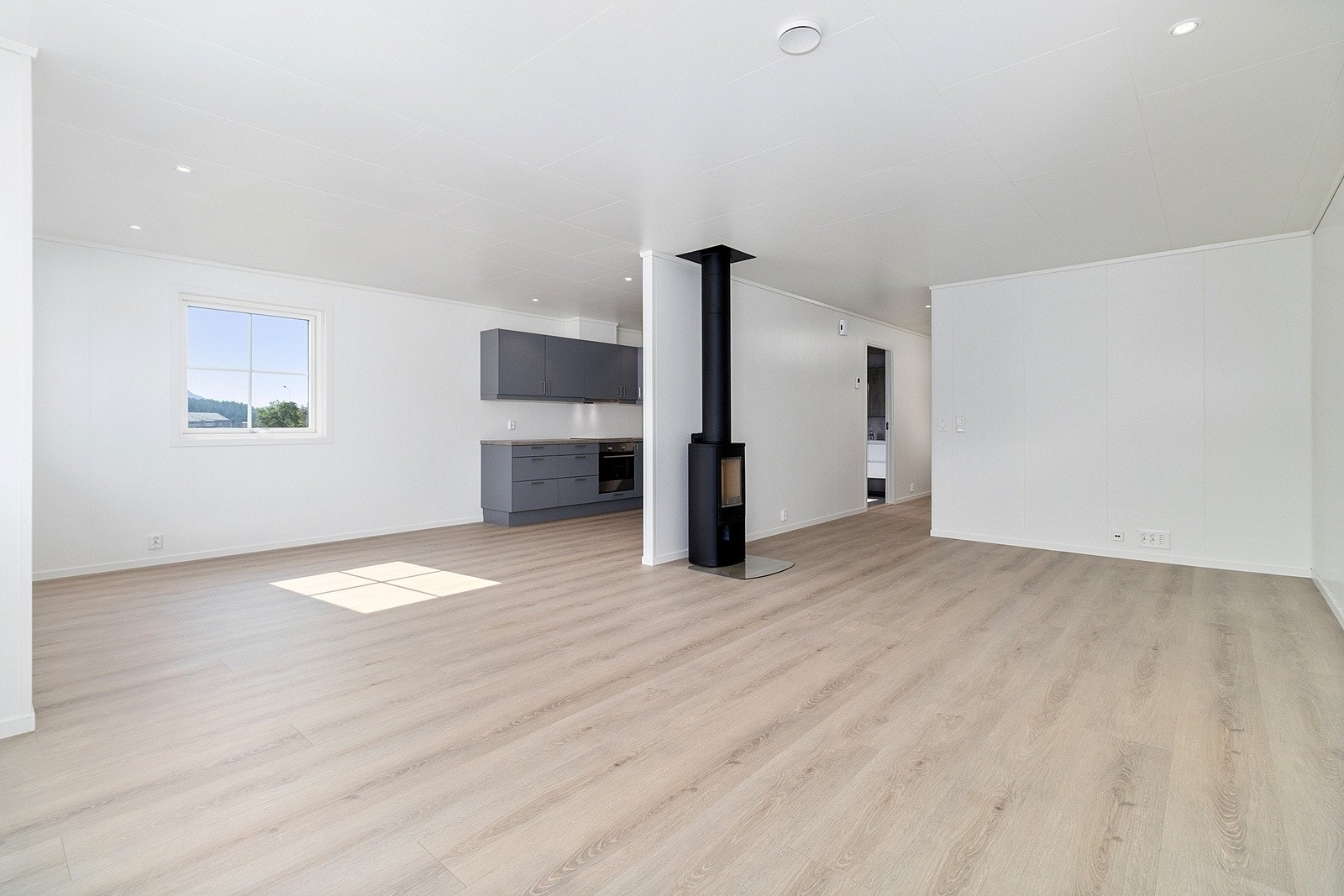 Peis i stuen skaper både varme og stemning på kjølige dager. Galleribilde