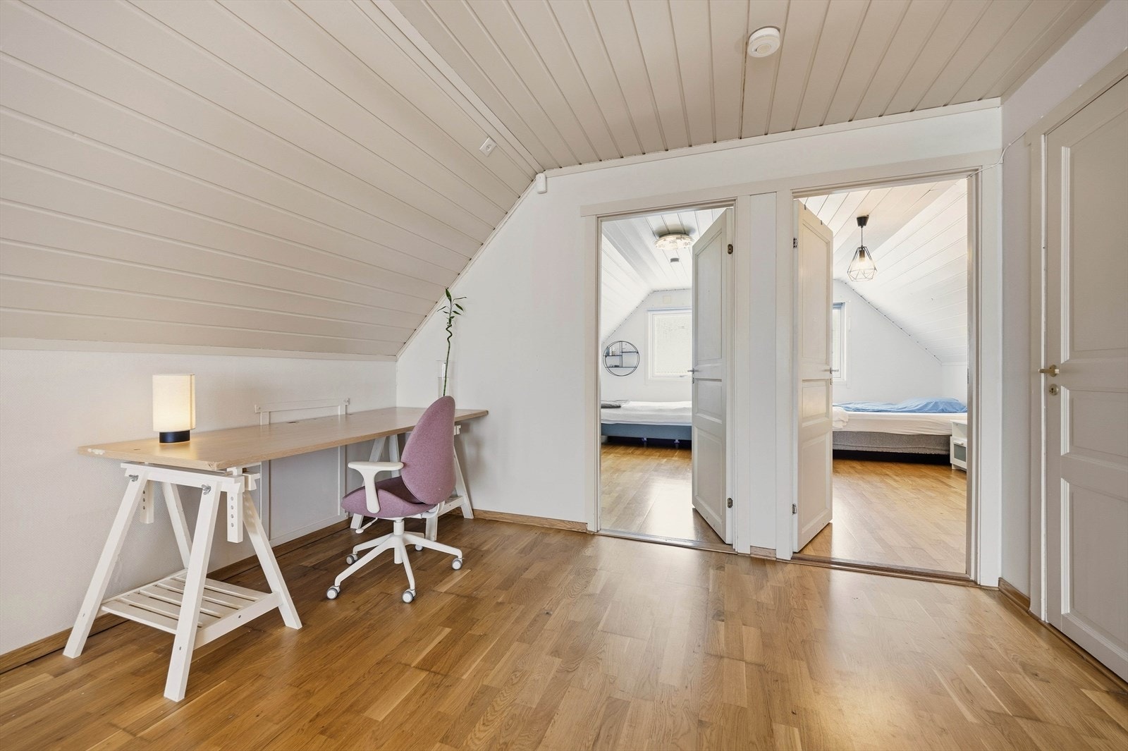 Loftstuen har også adkomst inn til bod, samt to soverom Galleribilde