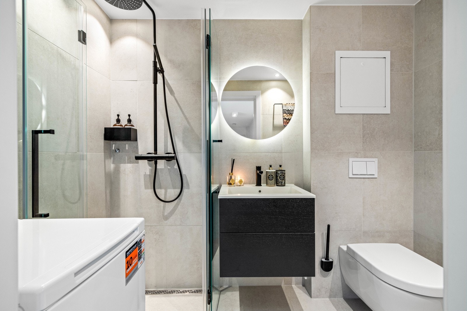 Badet har opplegg for vaskemaskin. Galleribilde