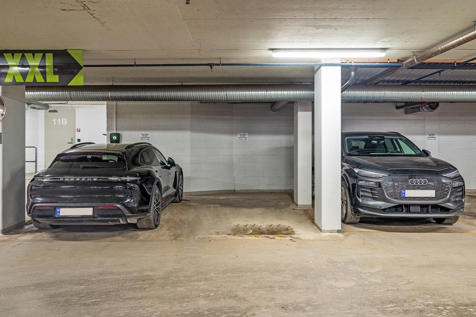 Det følger en garasjeplass i kjeller med heisadkomst Galleribilde