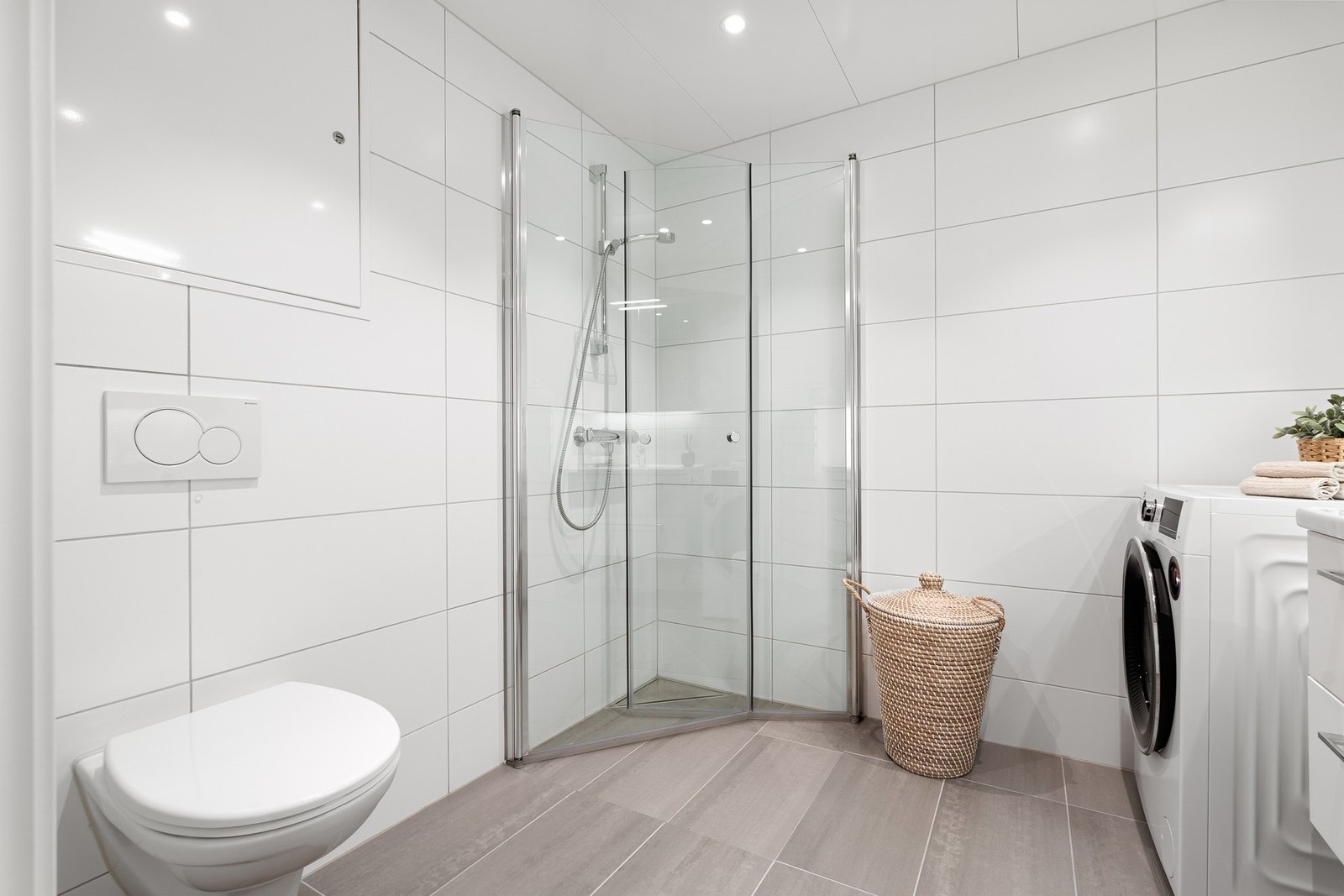 Badet har opplegg for vaskemaskin. Galleribilde