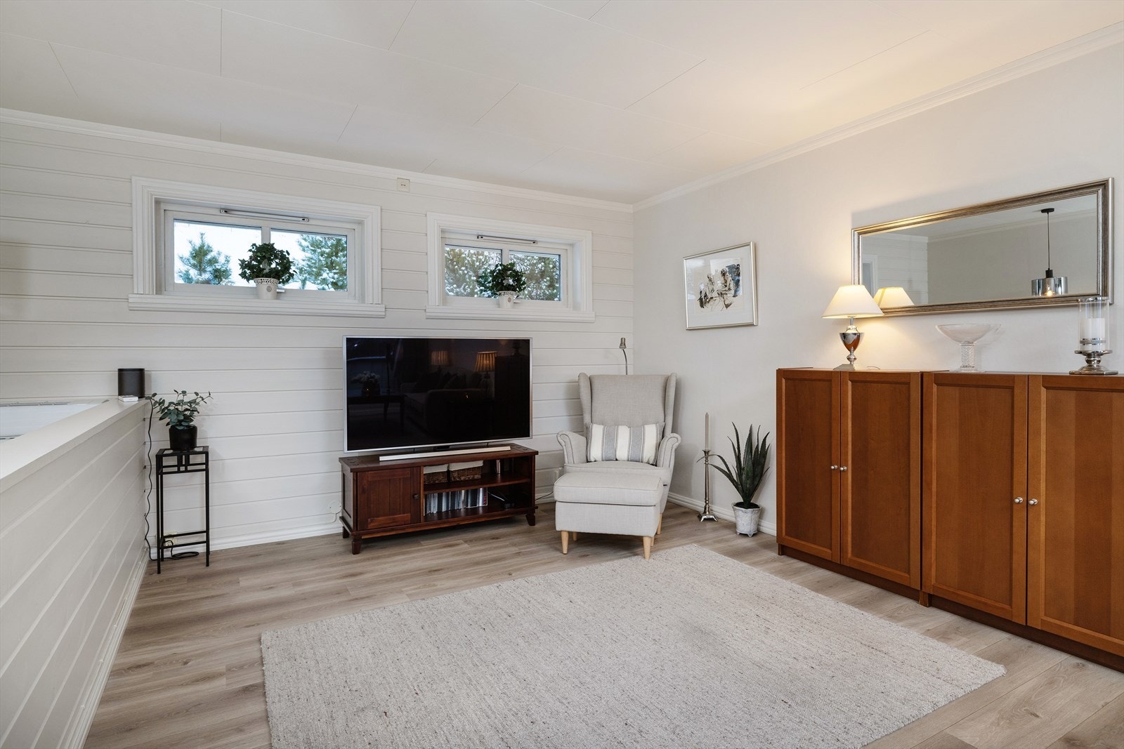 En egen TV-krok gir en naturlig soneinndeling i det store rommet. Galleribilde