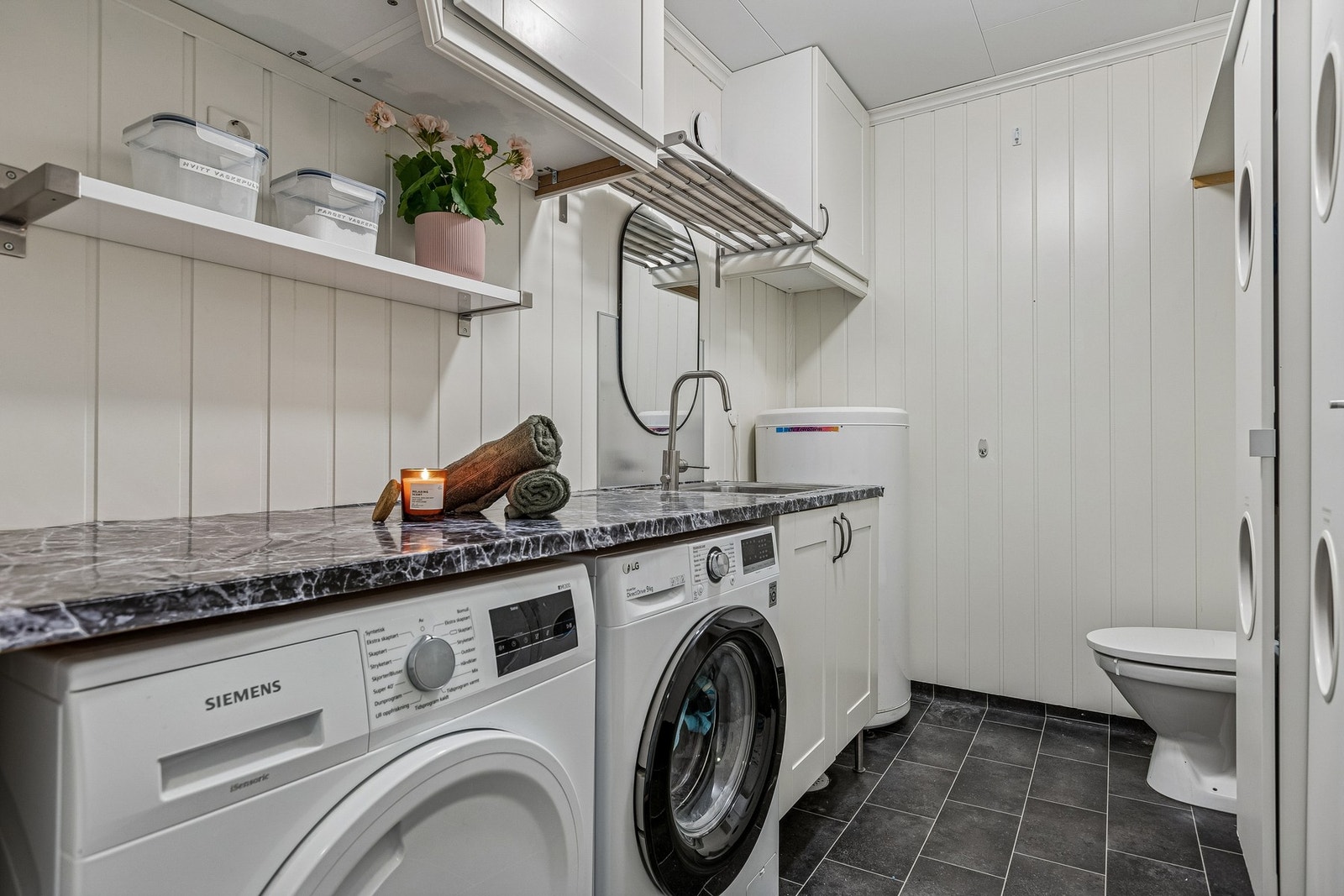 Boligen har også et separat vaskerom. Galleribilde