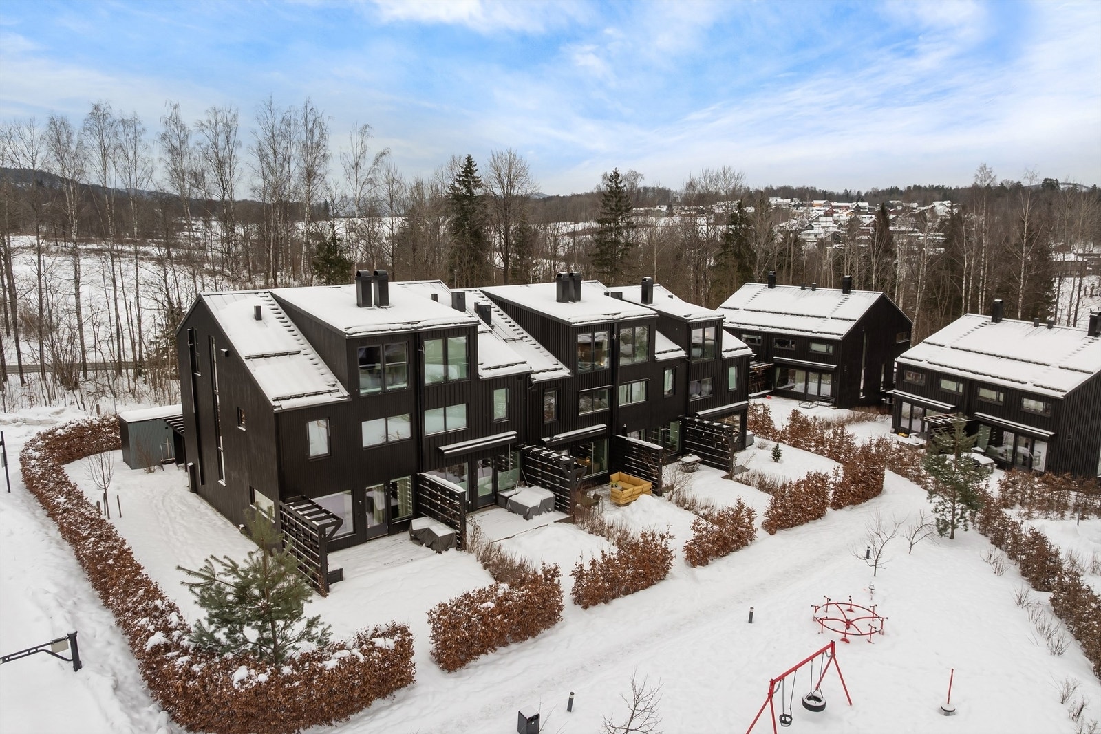 Staversletta består av rekkehus og kjeda tomannsboliger med til sammen 63 boenheter Galleribilde