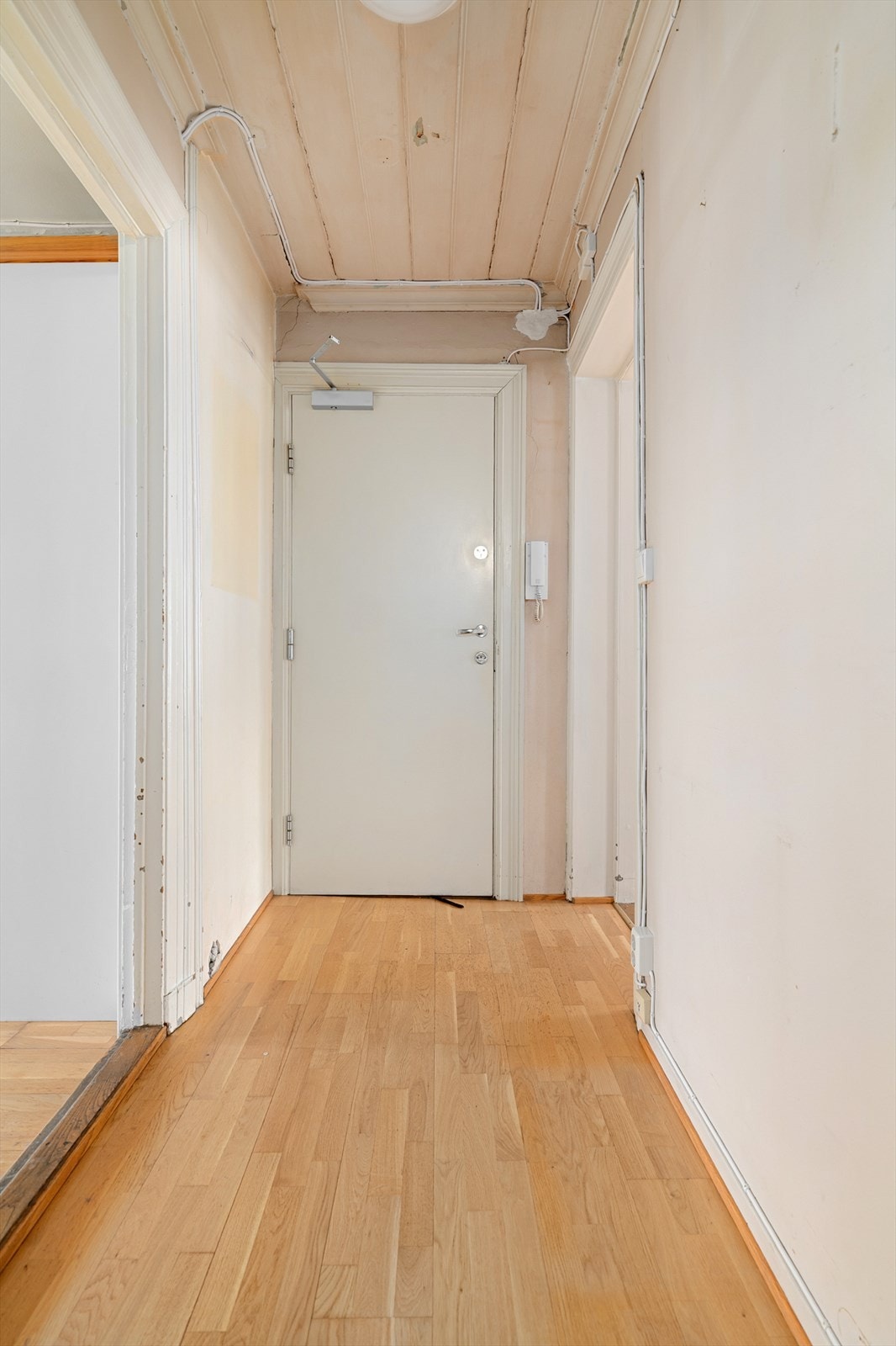 Inngangspartiet leder deg videre inn i boligens oppholdsrom. Galleribilde