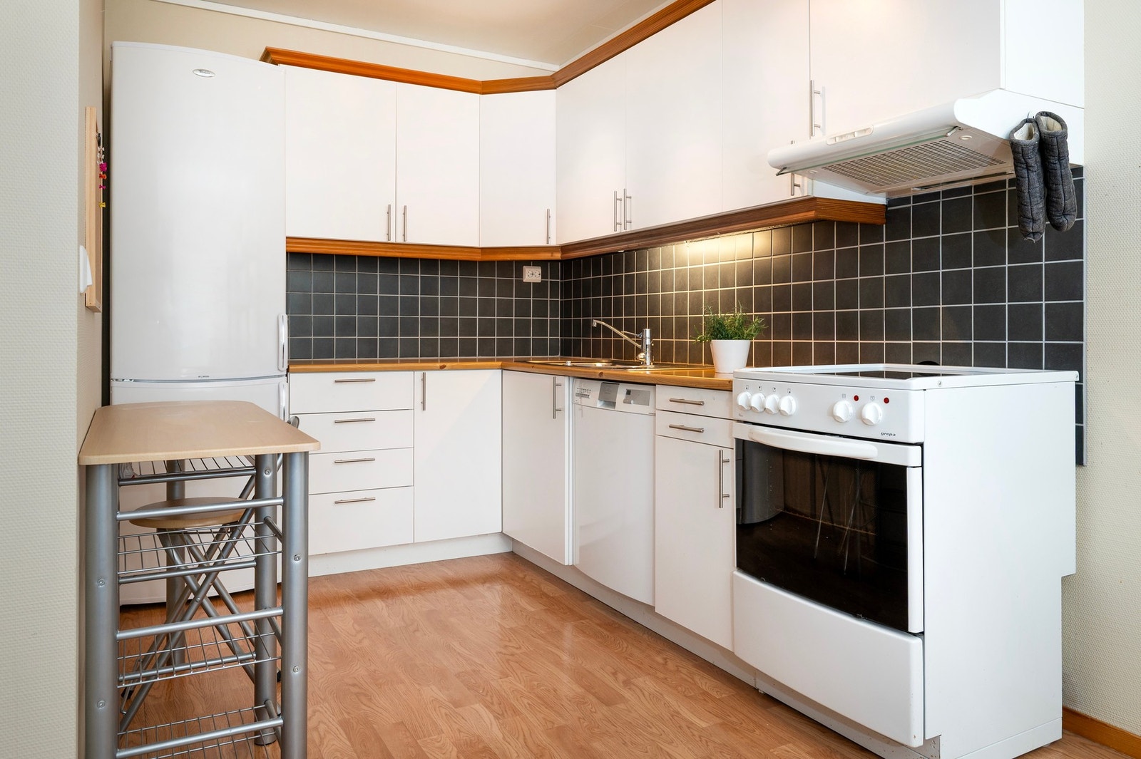 Hvitevarene medfølger i handelen. Galleribilde