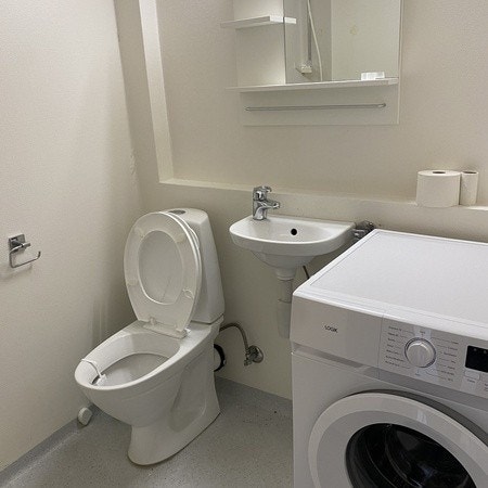 Bad med vaskemaskin Galleribilde