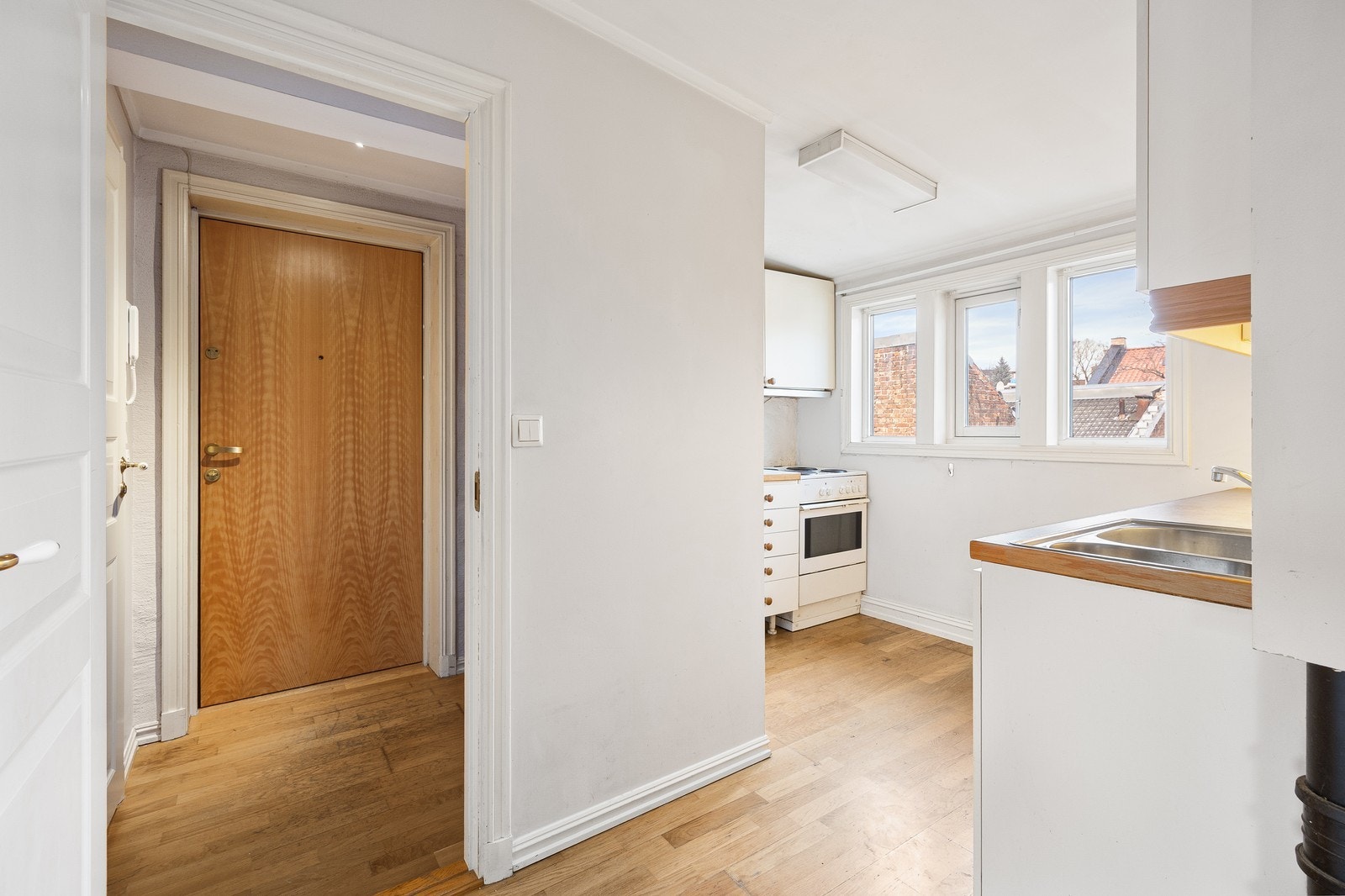 Leiligheten har delvis åpen kjøkkenløsning Galleribilde